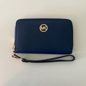 Michael Kors navy wallet. Never used.